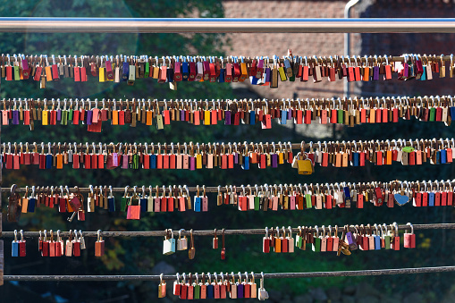 Love locks on the bridge at old harbor in Luneburg. Germany