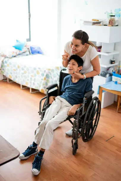 Photo of Therapist doing facial massage to a child with Cerebral Palsy