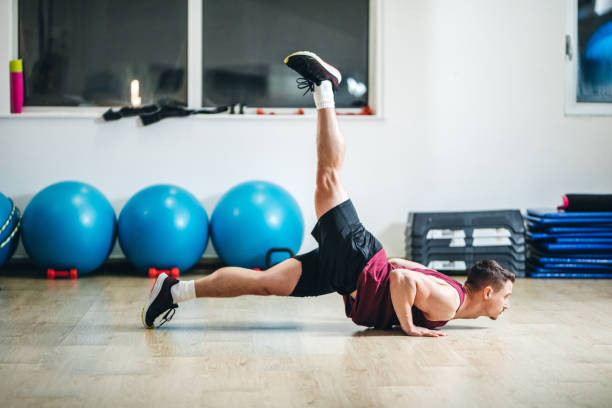 istock Young man in a local gym 1154440044