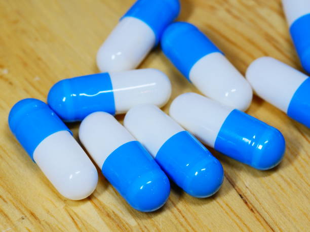 istock Antibiotic medical drug capsule 1154440317