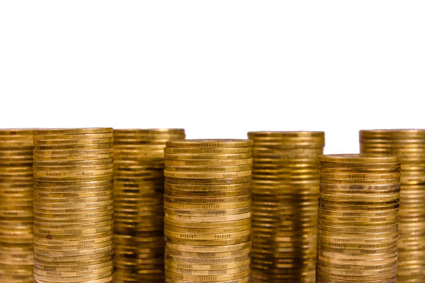 istock Stacks of the coins isolated on a white background 1154440471