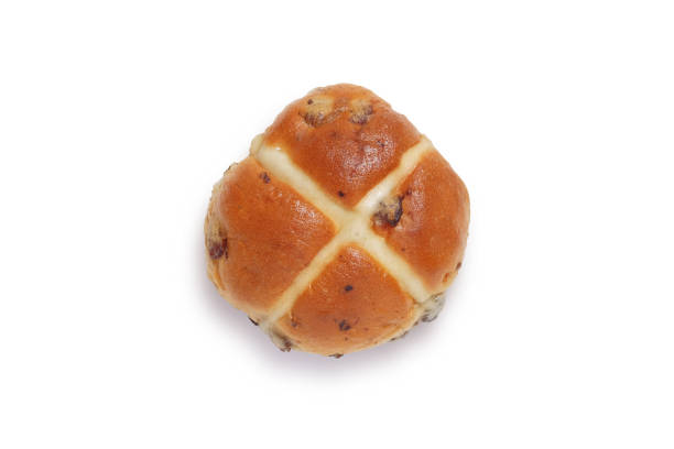 istock Single hot cross bun shot from above isolated on white background with clipping path 1154441259