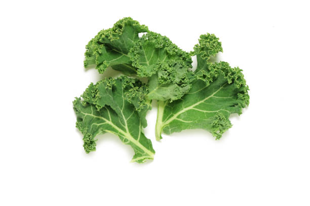 istock Kale leaves shot from above isolated on white background 1154441282