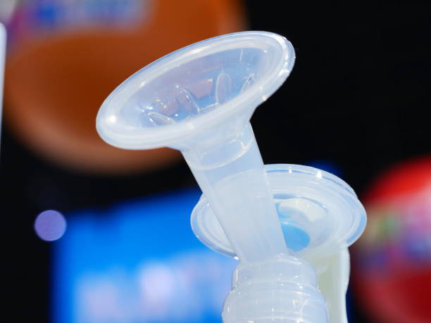 istock Breast pump equipment with milk for baby 1154443098