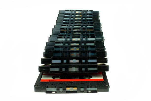 istock Stack vintage compact cassette tape, Close up set of old audio tapes 1154443833