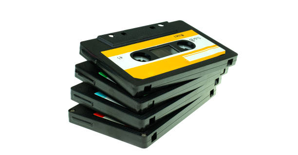 istock Stack vintage compact cassette tape, Close up set of old audio tapes 1154443834