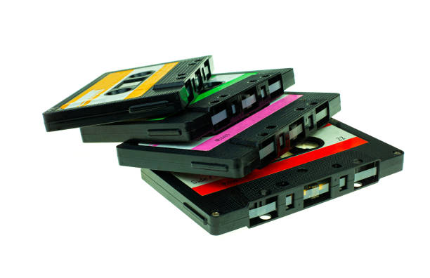 istock Stack vintage compact cassette tape, Close up set of old audio tapes 1154443835