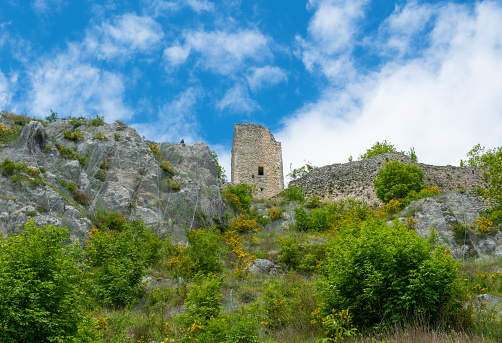 The green mountain area of Salto Lake, Lazio region province of Rieti, with the ruins of medieval castle named Poggio Poponesco