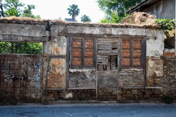 Antalya, Turkey - May 19, 2019: Old dilapidated dilapidated building on the streets of Kaleici.