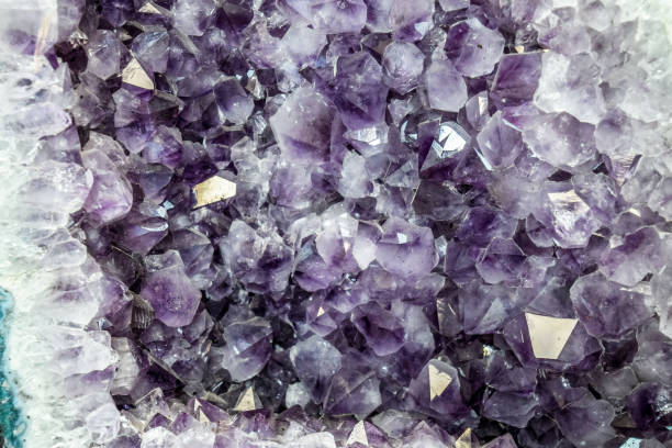 istock Amethyst druse, amethyst crystals close up view, precious 1154451710