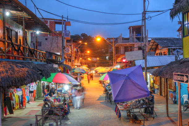 Street market in Montanita, Ecuador Night scene with street market in the small resort town of Montanita, Ecuador montanita ecuador stock pictures, royalty-free photos & images