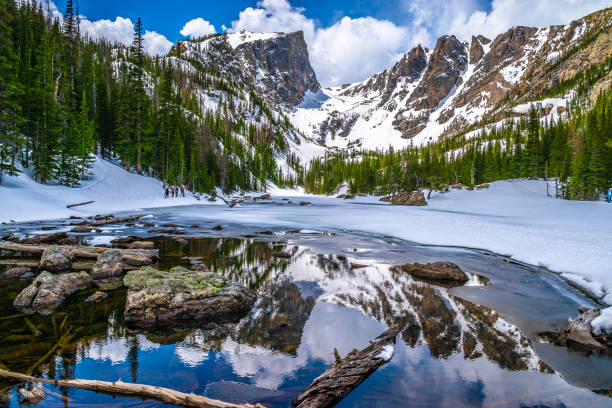 beautiful spring hike to dream lake in rocky mountain national park in estes park, colorado - mountain mountain peak snow spring imagens e fotografias de stock