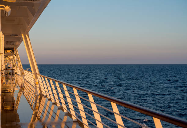 istock Cruise ship sailing the seas at sunrise or dawn 1154466049