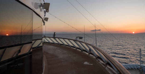 istock Cruise ship sailing the seas at sunrise or dawn 1154466744