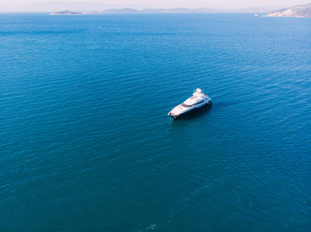 istock Aerial View Motor Yacht on Blue Sea 1154466886