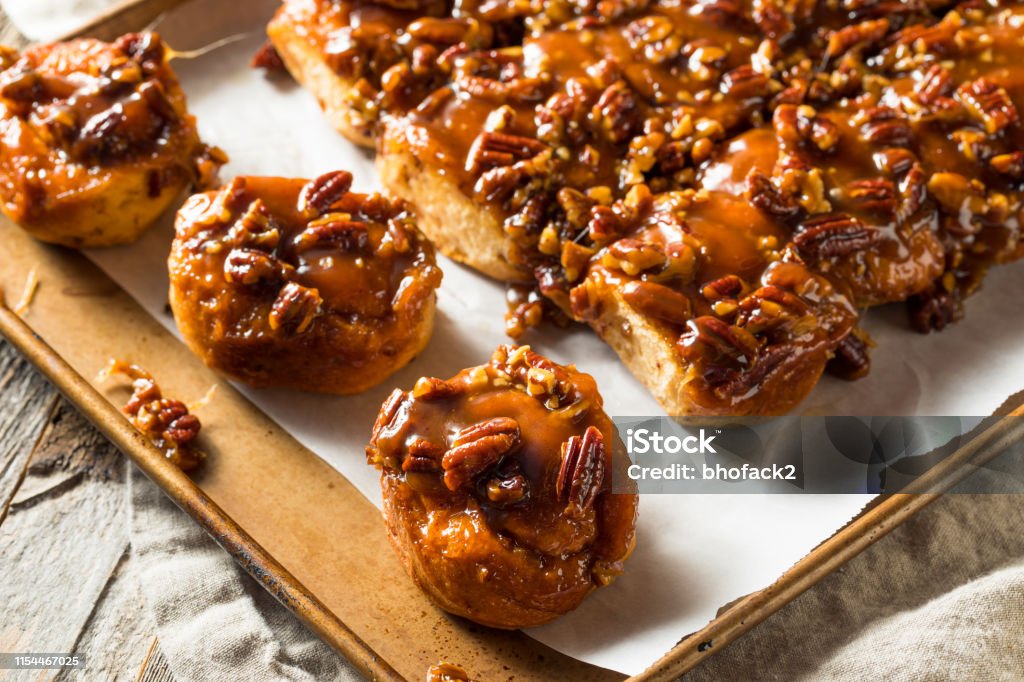 Homemade Pecan Schnecken Sticky Buns Homemade Pecan Schnecken Sticky Buns Ready to Eat Sticky Bun Stock Photo