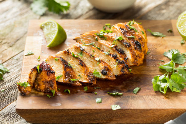 Homemade Grilled Chipotle Chicken Breast Homemade Grilled Chipotle Chicken Breast with Cilantro and LIme chicken breast photos stock pictures, royalty-free photos & images
