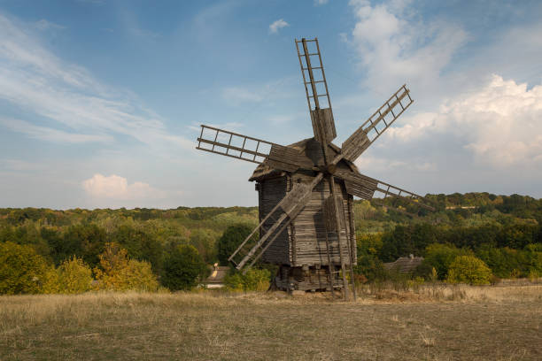 Old antique wooden mill in Pirogovo. Kiev, Ukraine Kiev, Ukraine - October 06, 2015: Old antique wooden mill in Pirogovo ukrainian village stock pictures, royalty-free photos & images