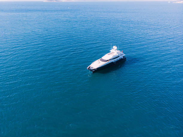 istock Aerial View Motor Yacht on Blue Sea 1154468164