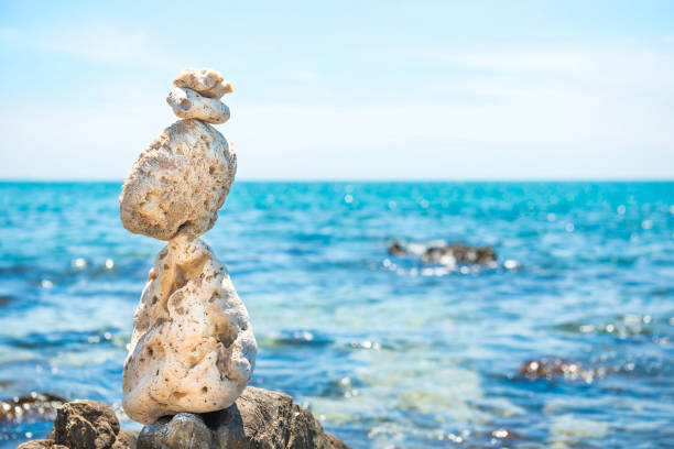 istock Zen stones balance at sea background 1154468571