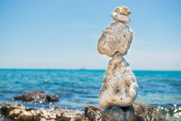 istock Zen stones balance at sea background 1154468642