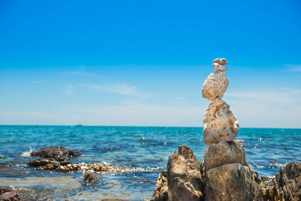 istock Zen stones balance at sea background 1154468698