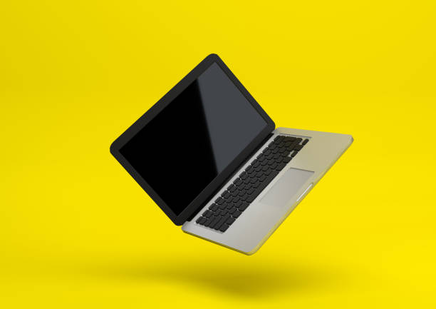 istock Laptop isolated on a pastel yellow background, 3d render 1154471065