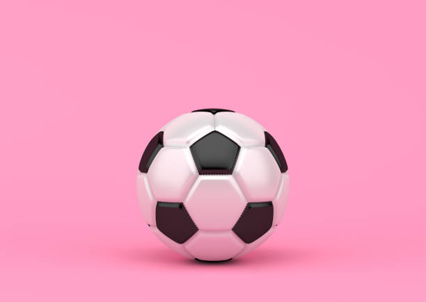 istock Soccer ball on pastel pink background 1154472982