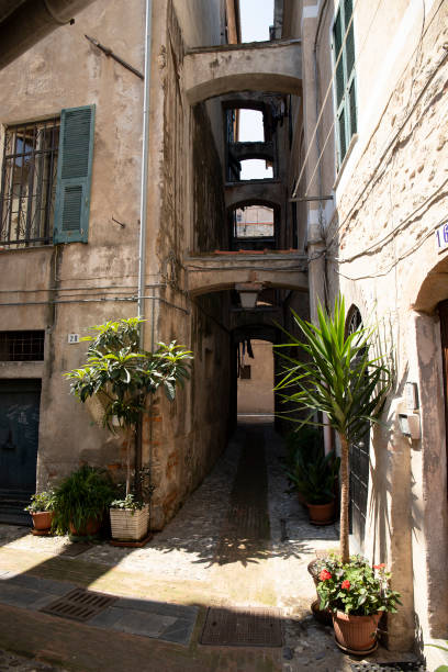 istock Albenga old town street view with arches 1154473202