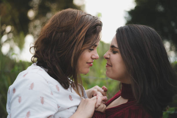 istock Couple of lesbians outdoors together concept 1154474248