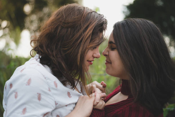 istock Couple of lesbians outdoors together concept 1154474254