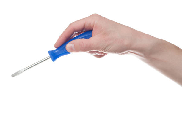 Male hand holding screwdriver isolated on white background.