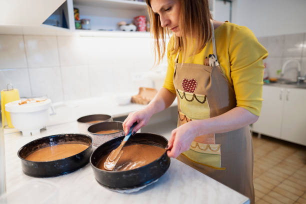 istock Female chef preparing in domestic kitchen 1154476107