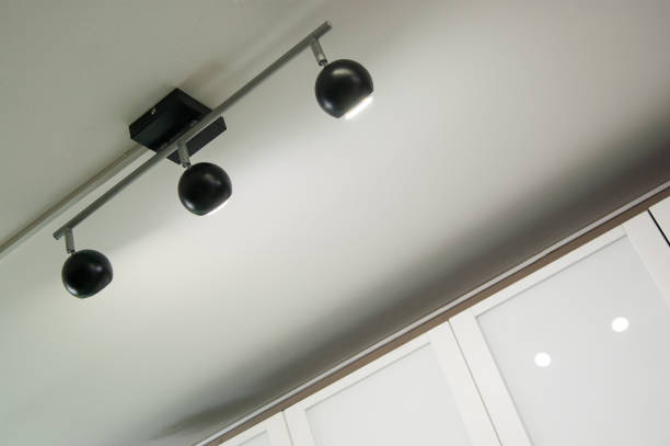 istock black triple directional luminaire with ceiling mount 1154479892