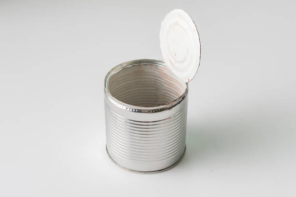 istock opened tin can on the table without leftovers from the food, meal concervations 1154481385