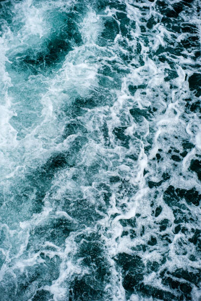 istock Abstract water ocean waves texture background. 1154485858