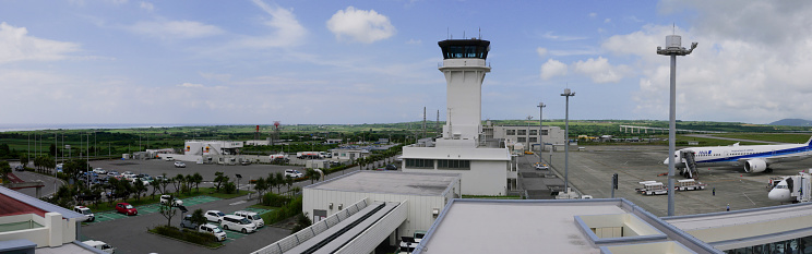 Okinawa,Japan-June 3, 2019: Airport Traffic Control Tower of Painushima Ishigaki airport in Okinawa viewed from observation deck