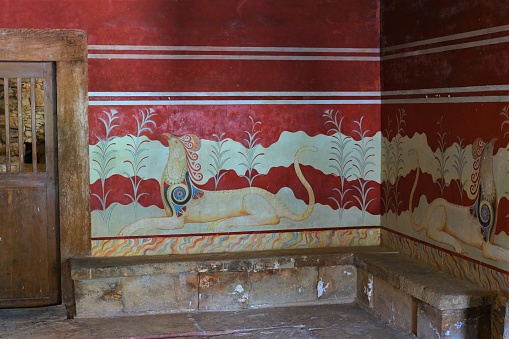 Knossos Palace archaeological site, Heraklion, Crete, Greece Site included various buildings and rooms in a state of being restored/excavated.  Fresco paintings, king and queens quarters, floors, drainage systems, storage urns, coliseum and surrounding land.