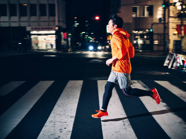 istock Nighttime Running in Tokyo Japan 1154489723