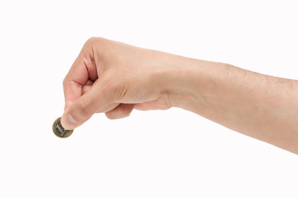 Cropped shot of an unrecognizable man hand putting an euro coin isolated on a white background