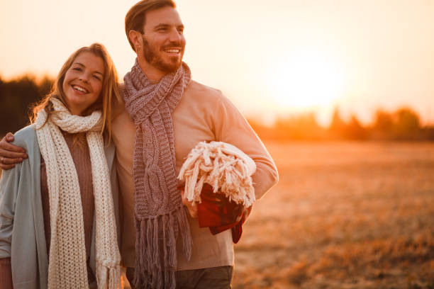 istock Couple hugging in field 1154491899