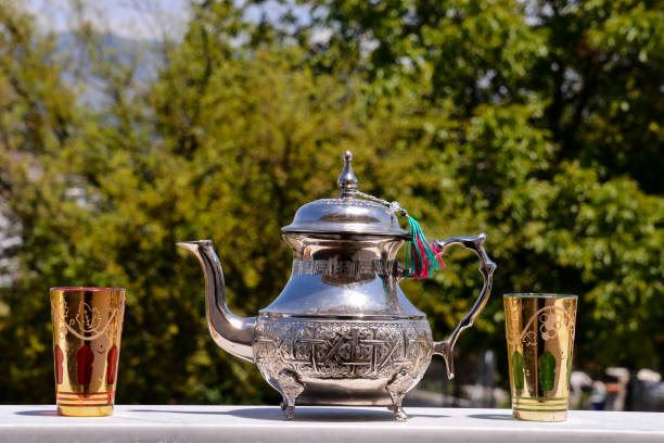 istock Oriental style pitcher tea carafe decanter 1154497541
