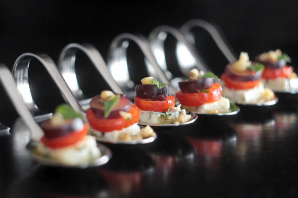 istock Blue cheese, walnut, olive oil and grape on appetizer spoons 1154502516