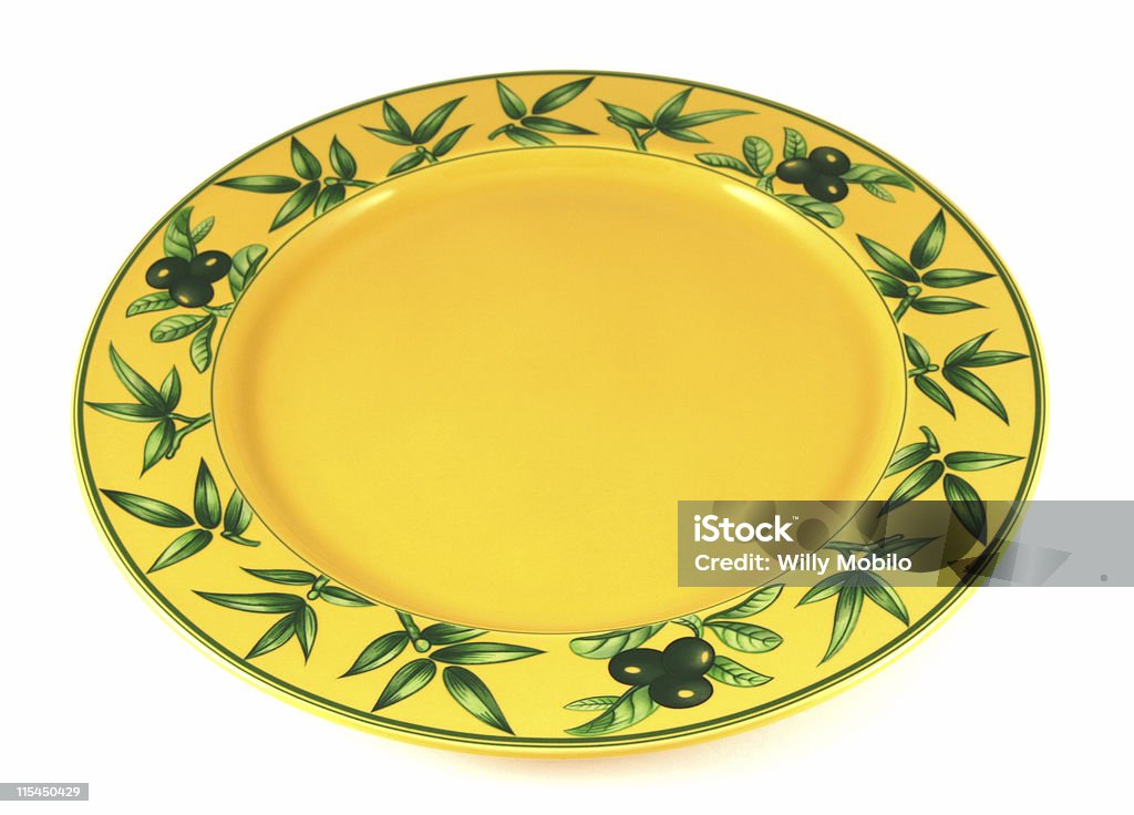 Yellow empty plate Yellow decorated empty plate isolated on white. Color Image Stock Photo