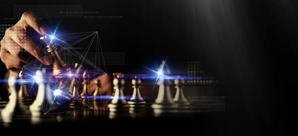 istock businessman hand control chess play figure business strategy manage ideas concept retro image tone 1154514312