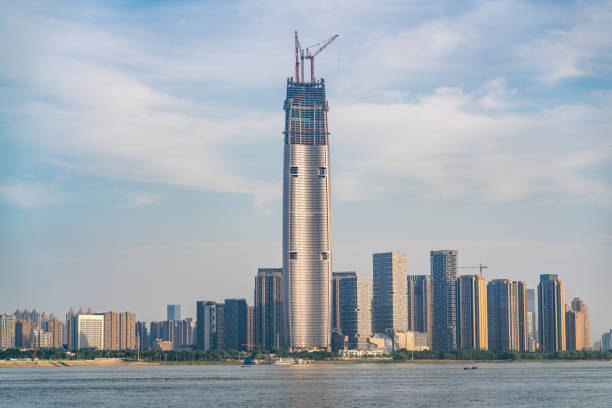 istock Wuhan skyline and Yangtze river with supertall skyscraper under construction in Wuhan Hubei China 1154514887