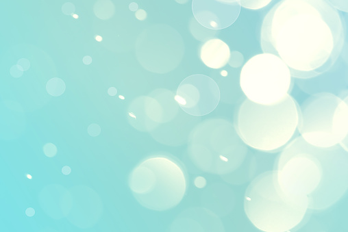Abstract bokeh light blue turquoise color background.  Turquoise Bokeh light