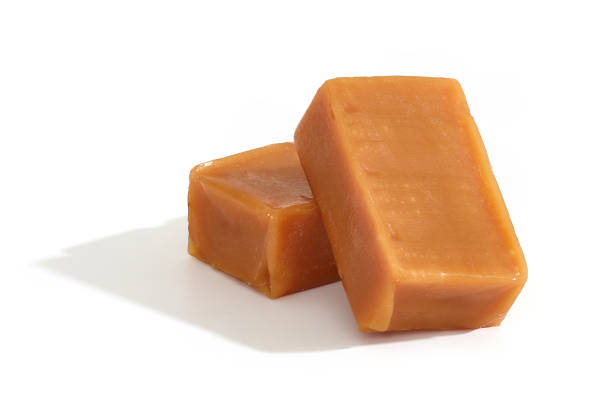istock caramel candies isolated on white background 1154519242