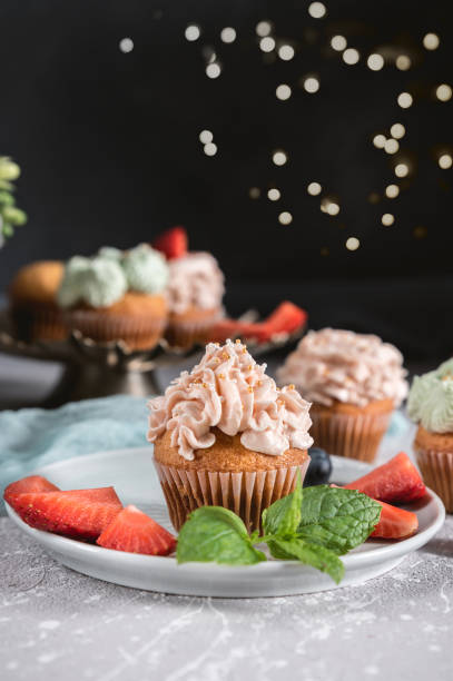 istock Homemade tasty cupcakes with fresh berries 1154519996