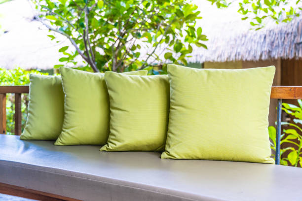 istock Vase plant on table decoration with pillow on sofa chair 1154525687